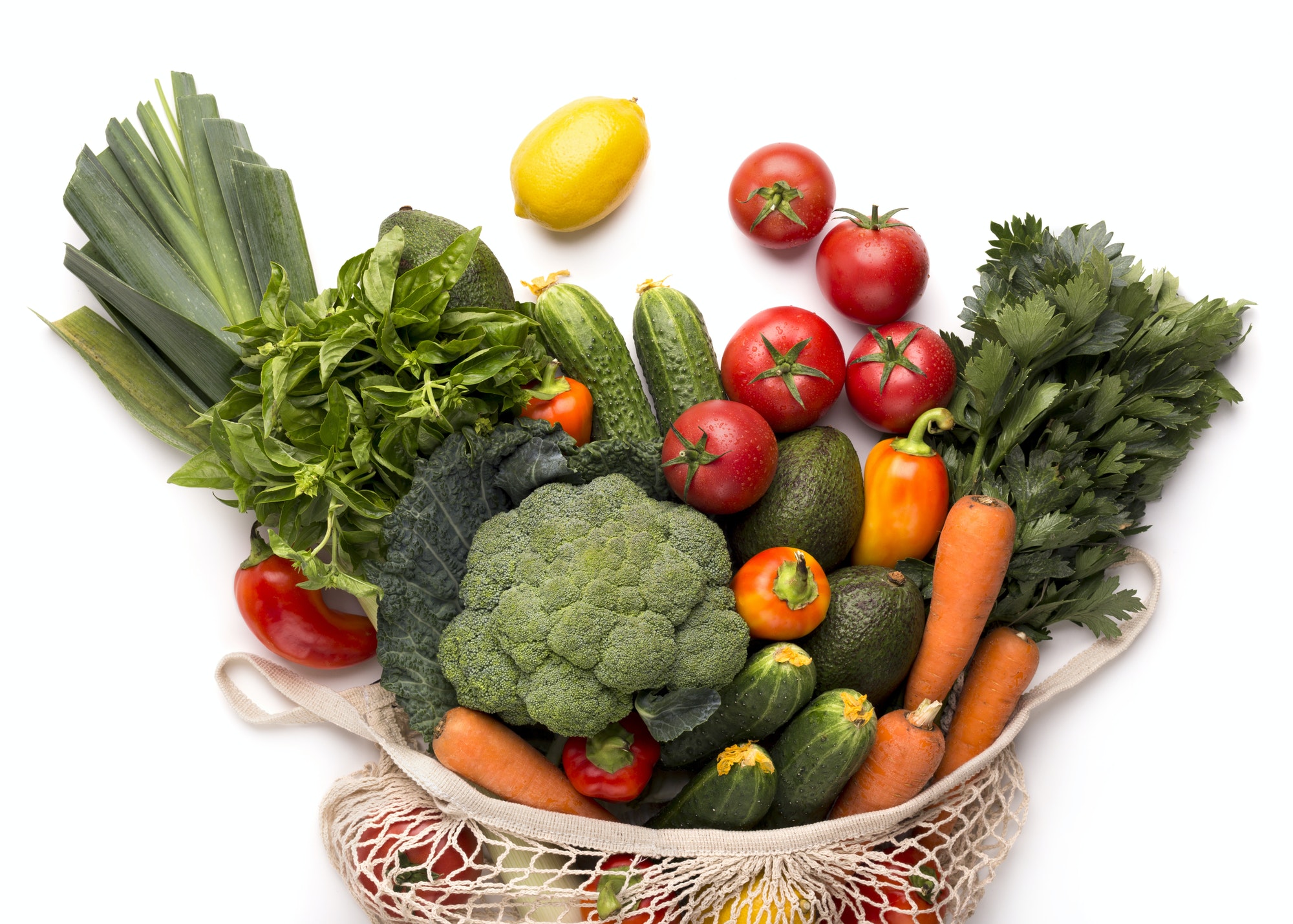 fresh-vegetables-from-farm-inside-eco-bag-on-white.jpg